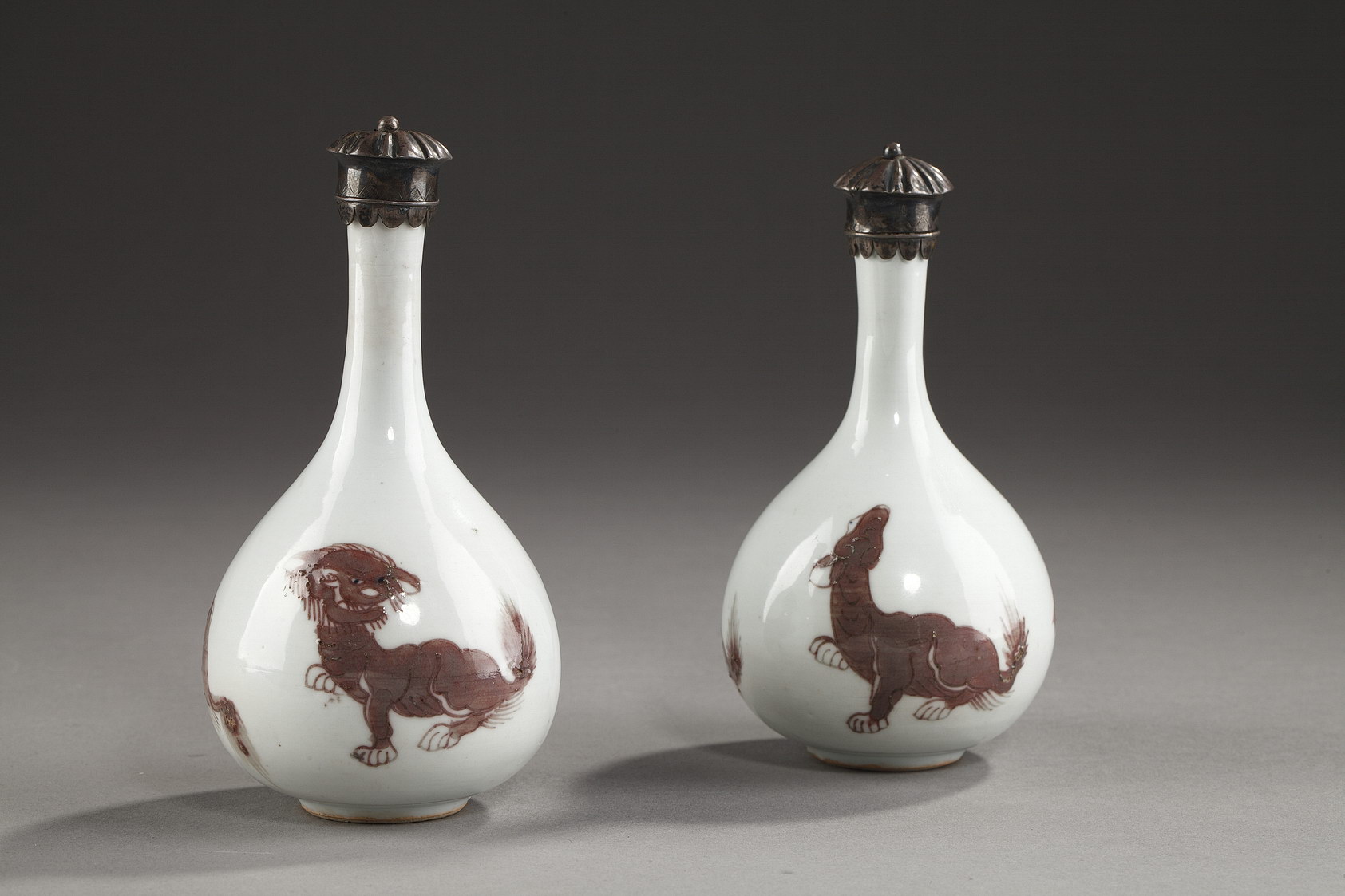 Two vases bottle with copper red decoration of  Mythical animals